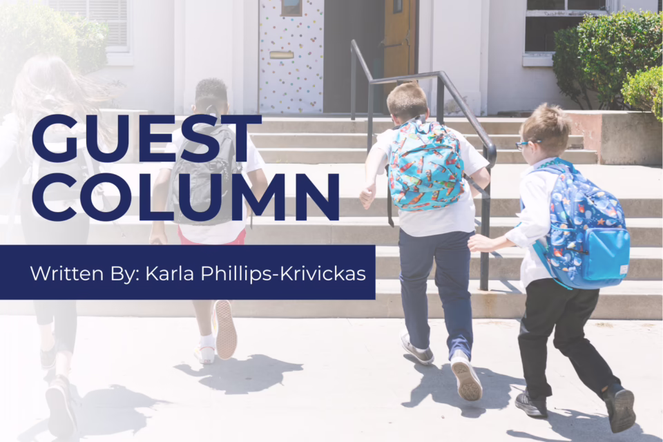 Children with backpacks enter a school. Text: "Guest Column" by Karla Phillips-Krivickas